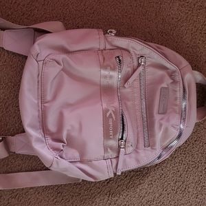 Shiny pink mini backpack
